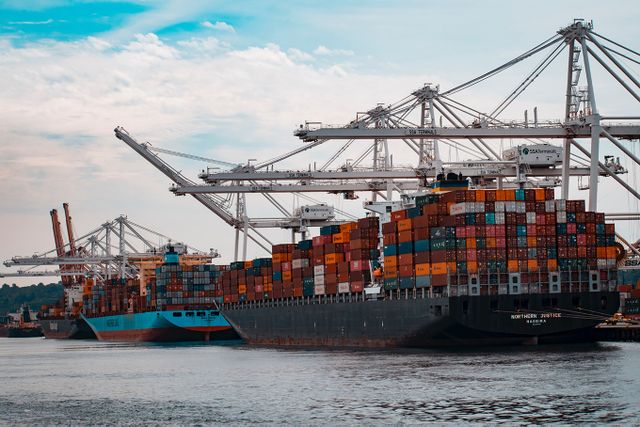 Shipping containers on ships in port